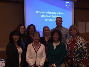 Back row: Renee Lushaj, Justice System Improvement Specialist with the Wisconsin Department of Justice; Connie Kostelac, Director, Bureau of Justice Information and Analysis (BJIA) with the Wisconsin Department of Justice, Division of Law Enforcement Services; Beth Robinson, Alternative Treatment Coordinator with CJTS; Ryan McMillen, Adult Drug Treatment Court Coordinator/Case Manager in Wood County Front row: Kristin Schier, Treatment Court Coordinator in Grant County; Judge Ellen Brostrom from Milwaukee County; Sabrina Gentile, Justice Programs Coordinator Wisconsin Department of Justice; and Judge Kathryn Foster with Waukesha County.